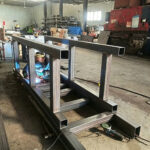 heavy equipment welding workshop fabrication large steel machine frame