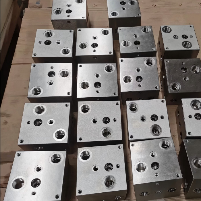 Bloc de vannes hydrauliques OEM avec bloc collecteur en aluminium personnalisé pour équipement industriel