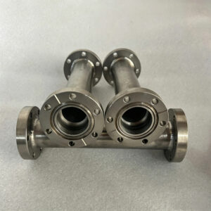 ConFlat flange half nipple manufactured from precision welded titanium